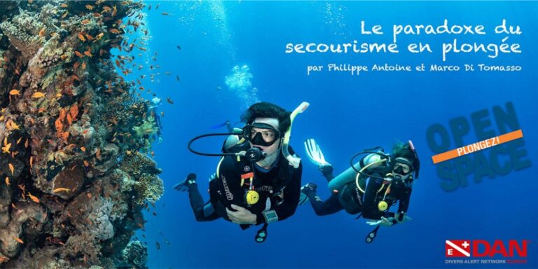 Plongée sous-marine avec des récifs colorés et des plongeurs explorant la biodiversité marine.