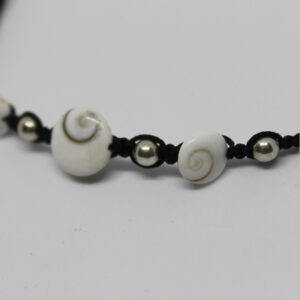 bracelet oeil sainte lucie 2 Un bracelet orné d'yeux de Sainte-Lucie évoque les mystères de l'océan, parfait pour les passionnés de plongée. 🌊