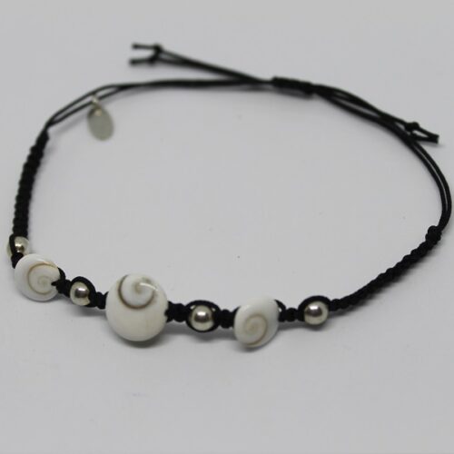 bracelet oeil sainte lucie Bracelet orné de coquillages "œil de Sainte-Lucie", symbole de protection maritime, idéal pour les passionnés de plongée.