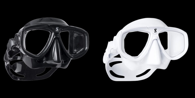 Masques de plongée en noir et blanc, essentiels pour explorer les fonds marins en toute clarté.